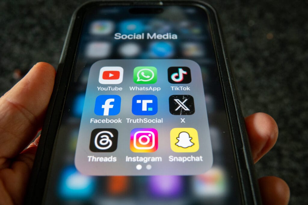 Phone with social media icons on display
